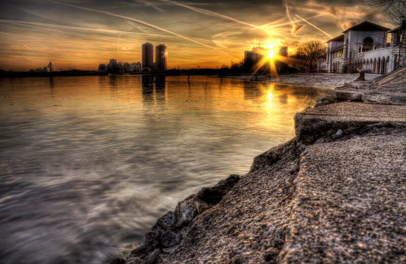 Sunset over city waterfront