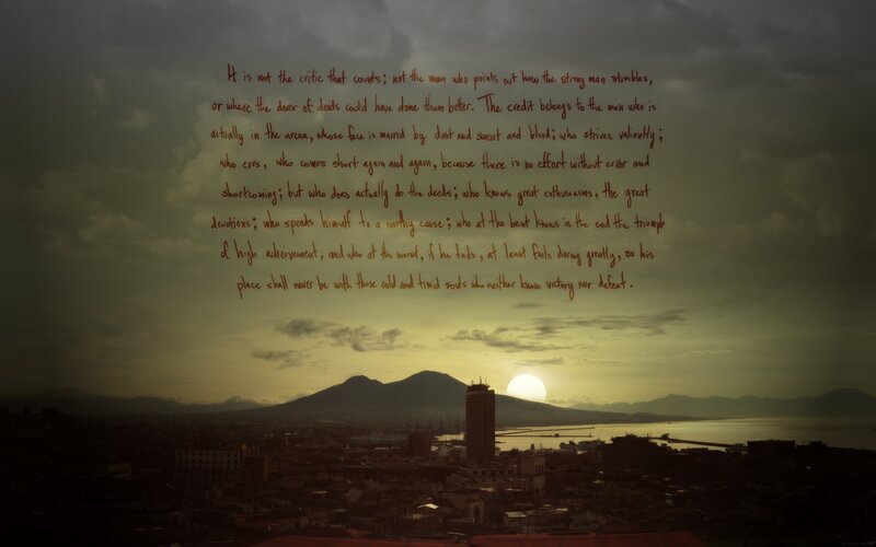 Sunset over city with quote