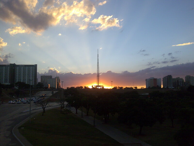 Sunset over city with tower