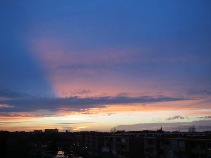 Sunset over Cityscape — Blue, Serene, Photograph, Buildings