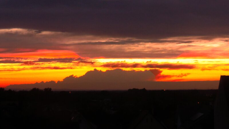 Sunset over Cityscape — Orange, Dramatic, Photograph, Clouds, Sky