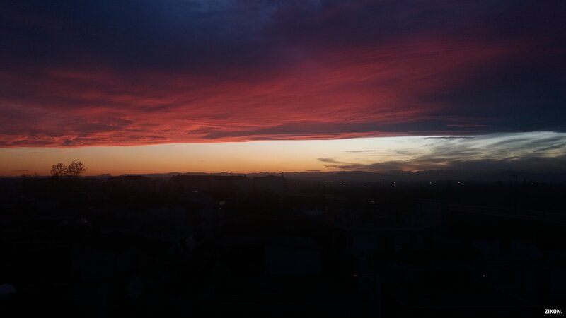 Sunset over Cityscape — Red, Dramatic, Photograph, Clouds
