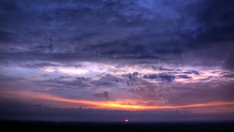 Sunset over Clouds — Dramatic