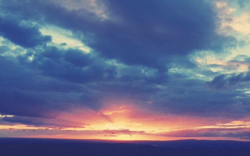Sunset over Clouds — Purple, Dramatic, Photograph