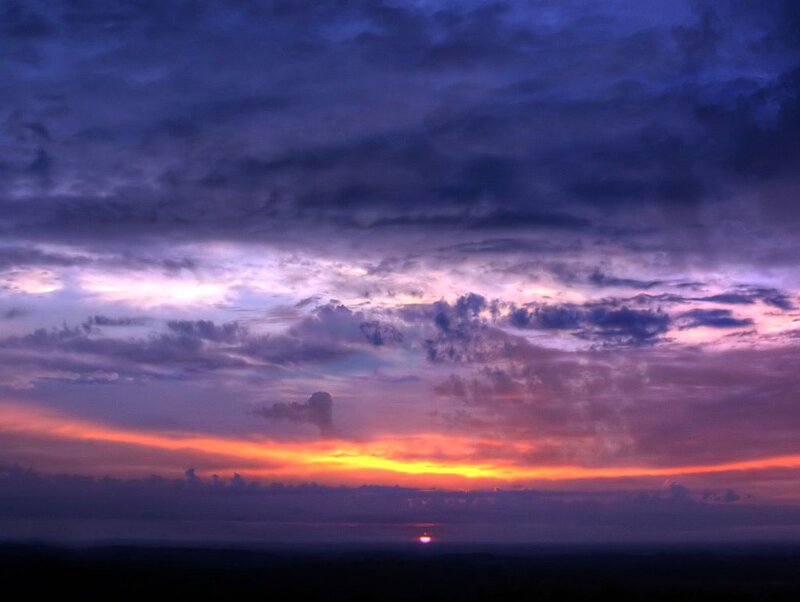 Sunset over Clouds — Purple, Dramatic