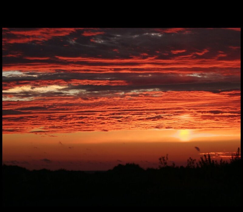 Sunset over Clouds — Red, Dramatic, Photograph, Sun, Silhouette, Orange