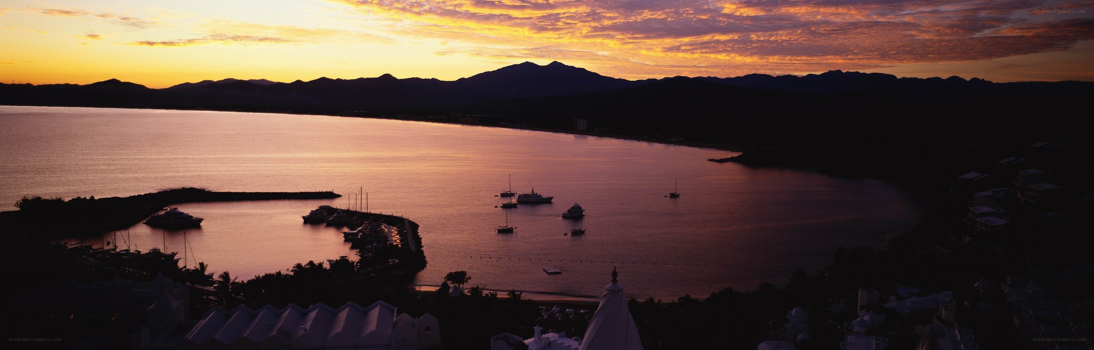 sunset over coastal bay