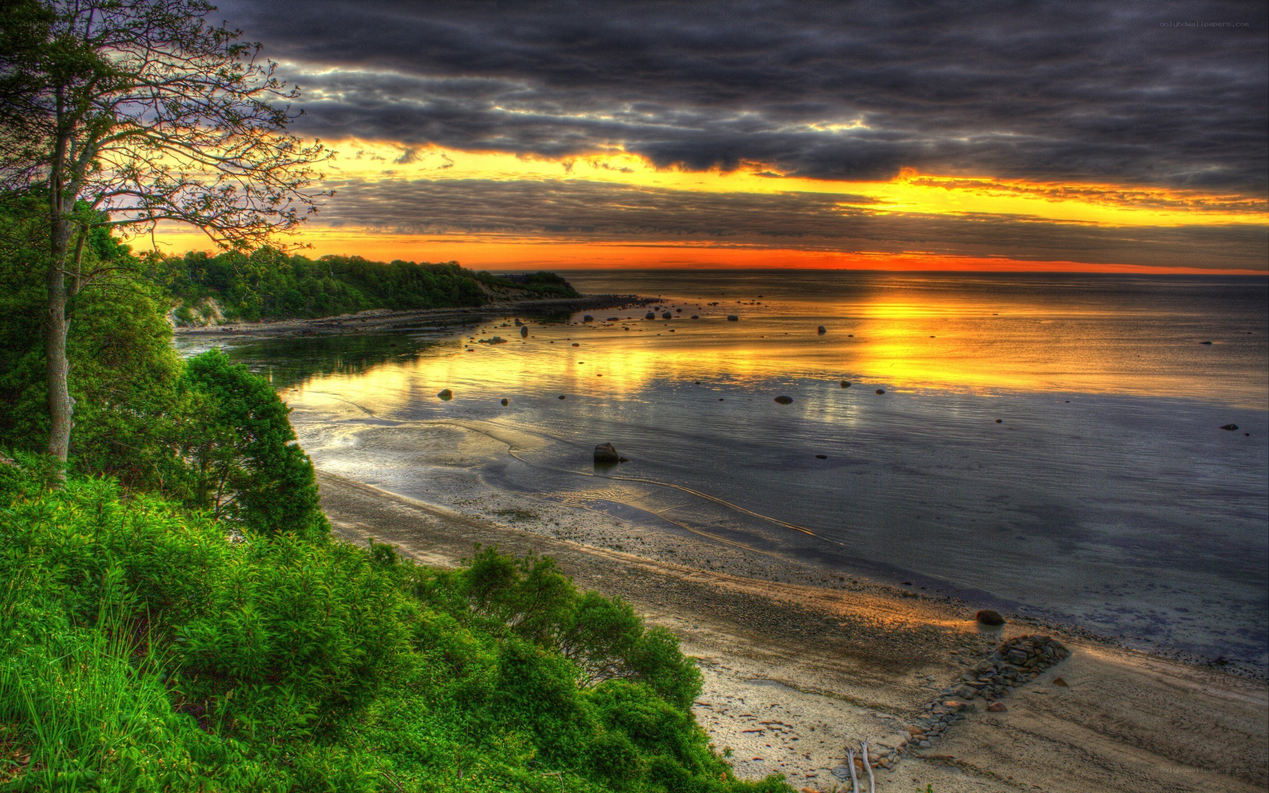 sunset over coastal bay