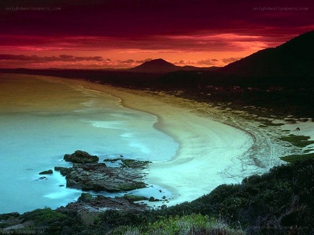 sunset over coastal bay