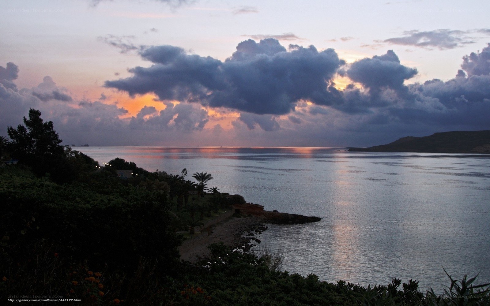 sunset over coastal bay