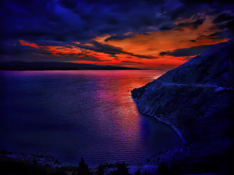 Sunset over Coastal Bay — Blue, Dramatic, Photograph, Sea