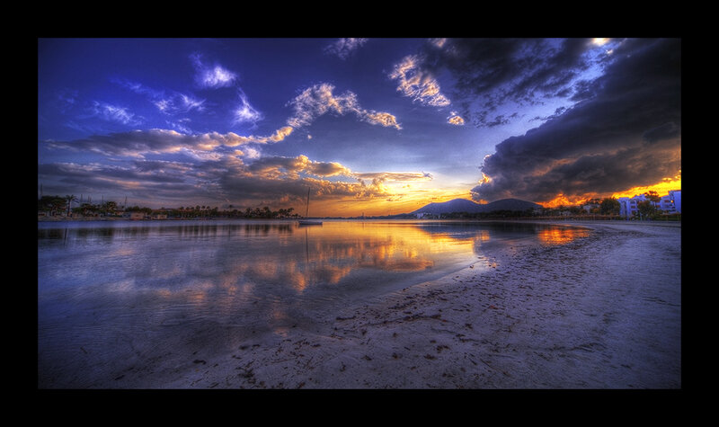 Sunset over Coastal Bay — Blue, Dramatic