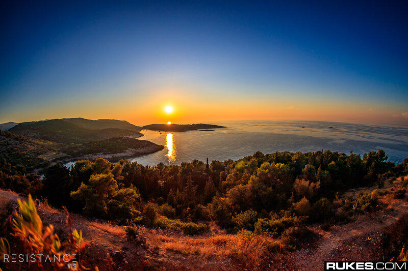 Sunset over Coastal Bay — Blue, Serene, Photograph, Sun