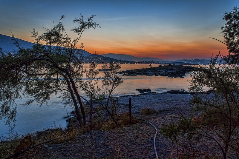 Sunset over Coastal Bay — Orange, Serene, Photograph, Trees