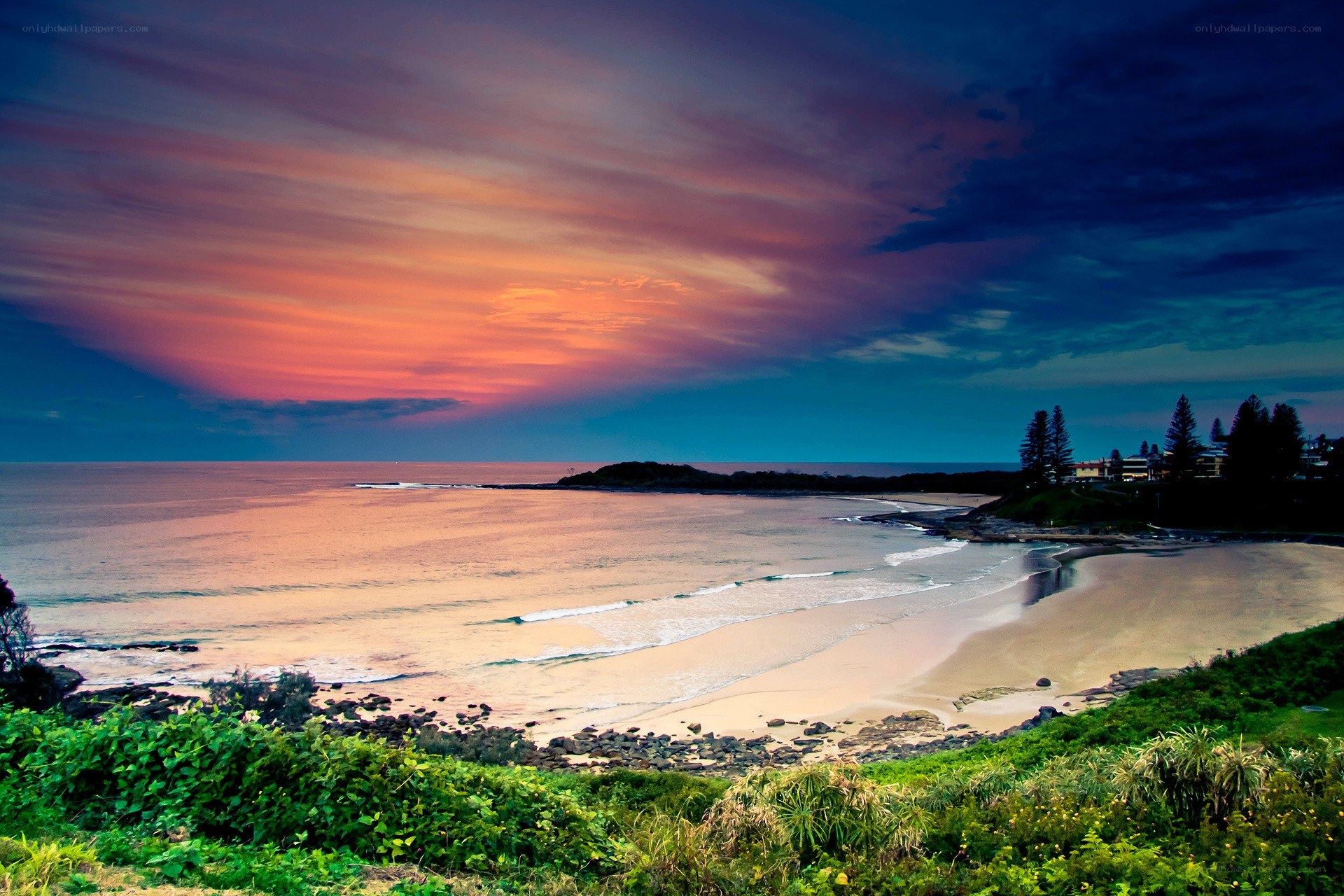 sunset over coastal beach