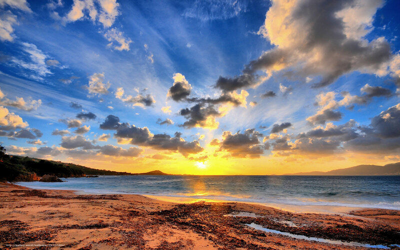 sunset over coastal beach