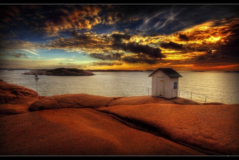 Sunset over coastal cabin