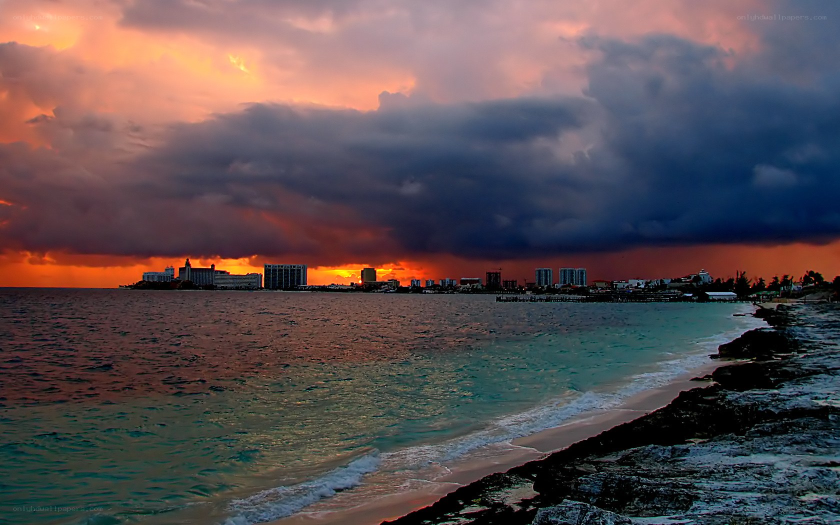 Sunset over coastal city