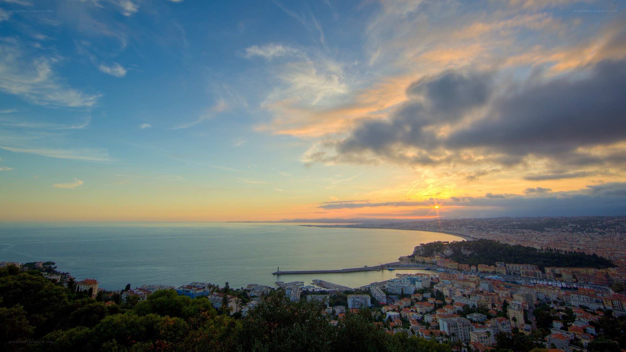Sunset over coastal city