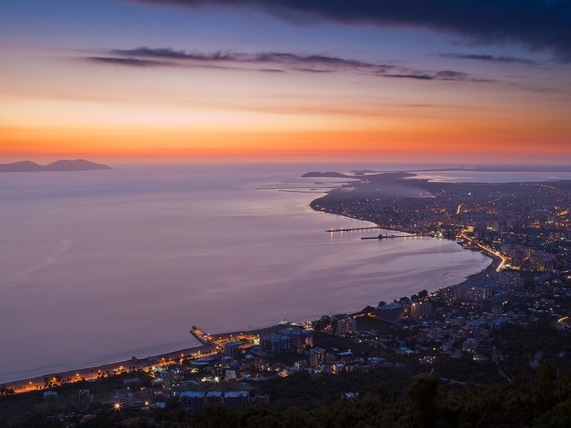 sunset over coastal city