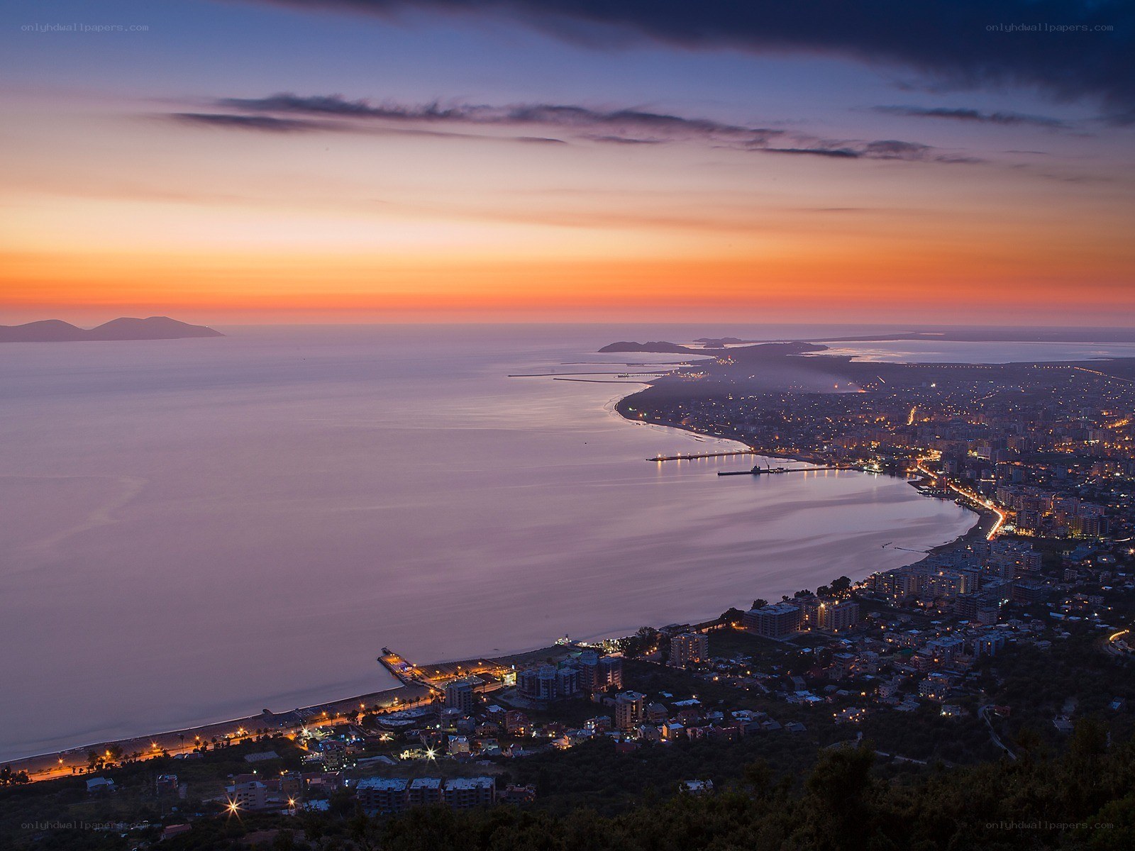 sunset over coastal city