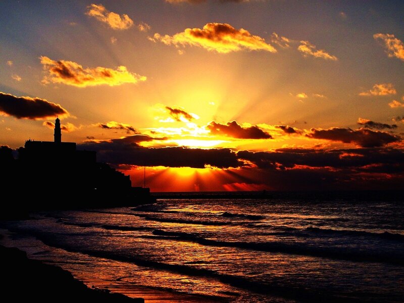 Sunset over coastal city