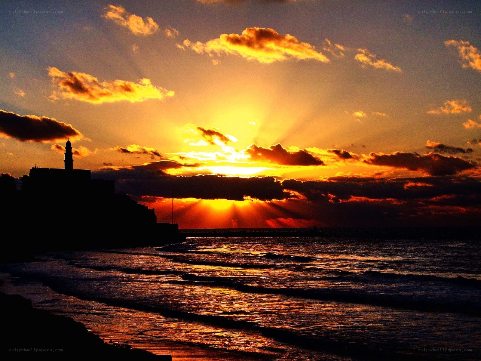 Sunset over coastal city