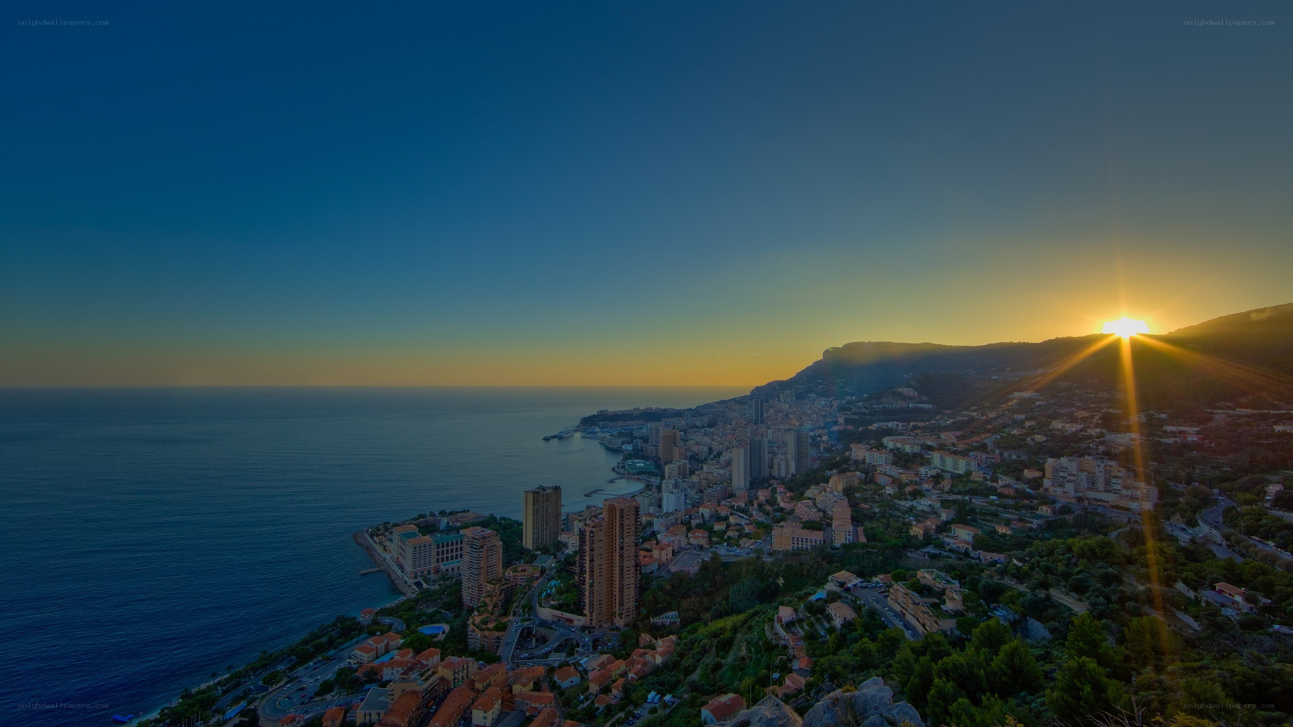 Sunset over coastal city