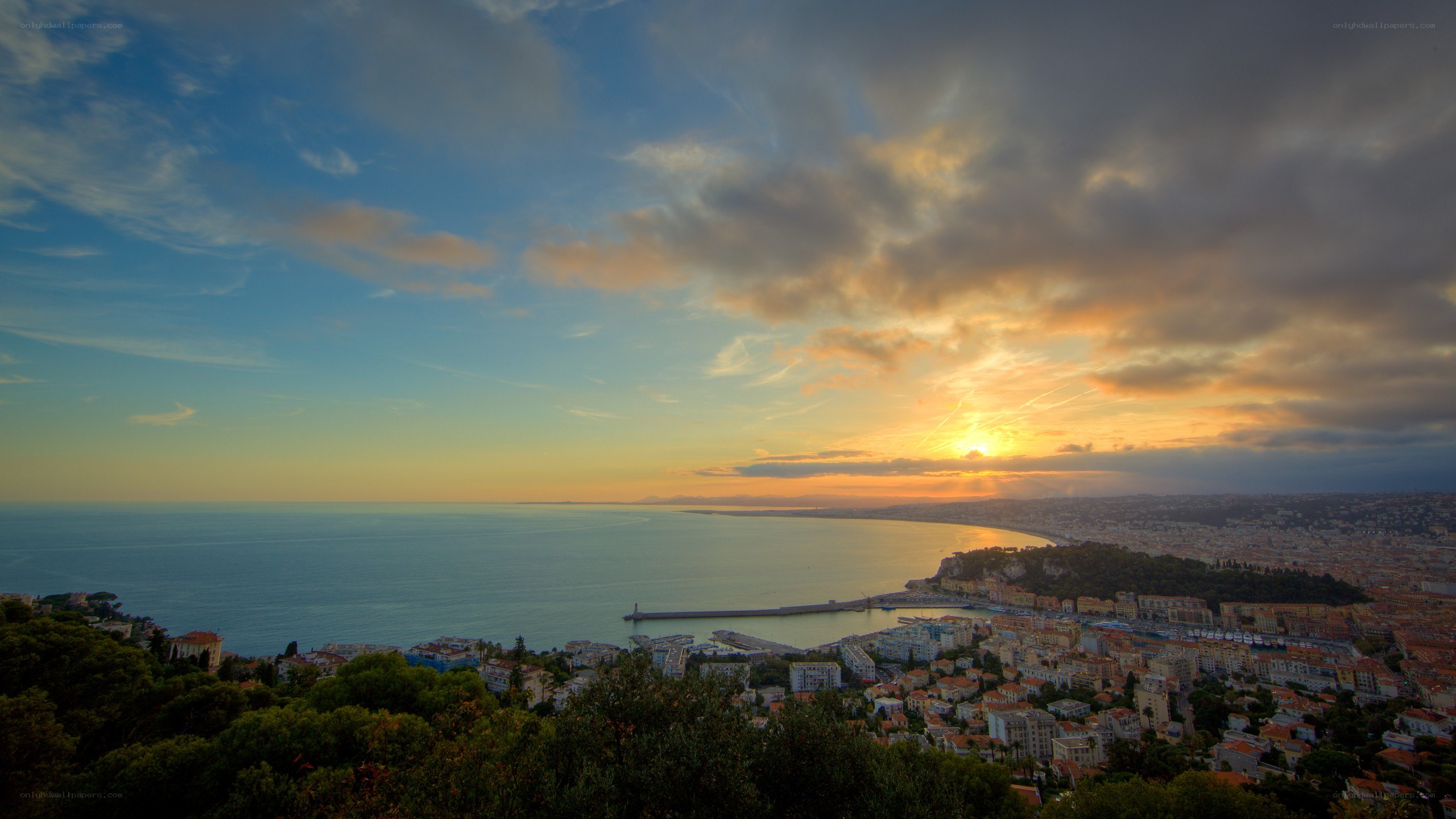 sunset over coastal city