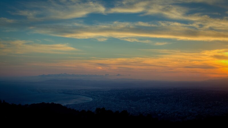 sunset over coastal city