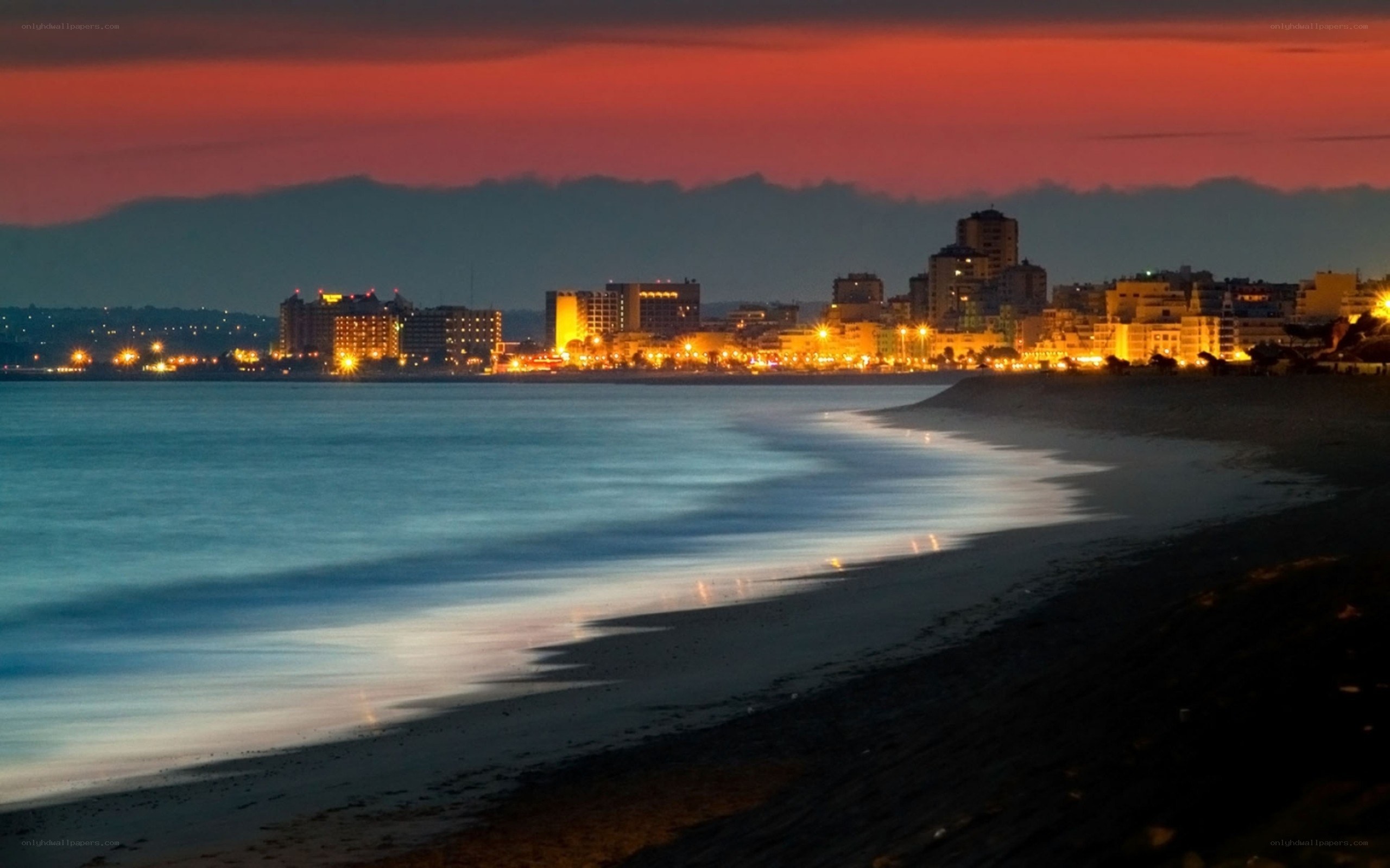 sunset over coastal city