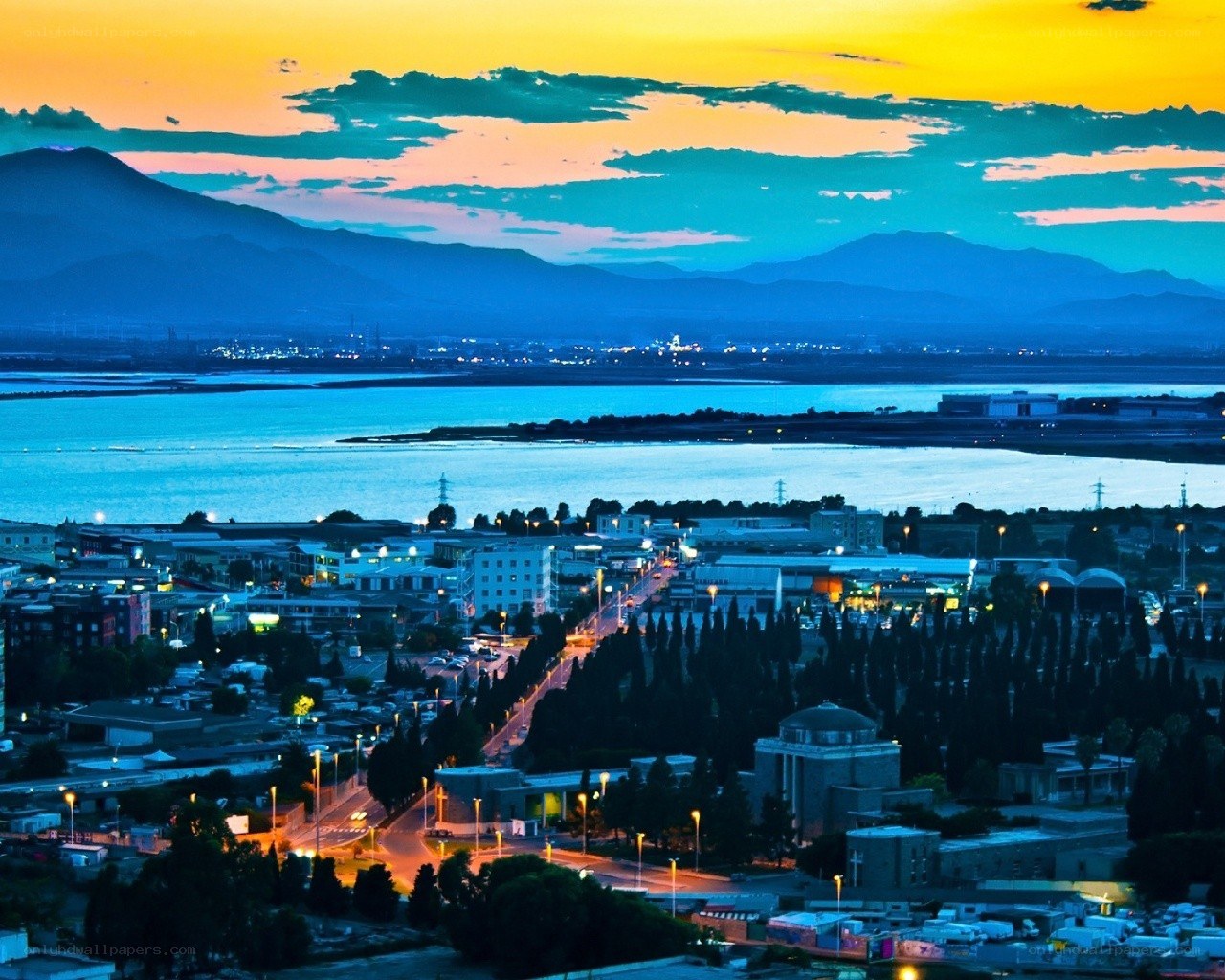 sunset over coastal city