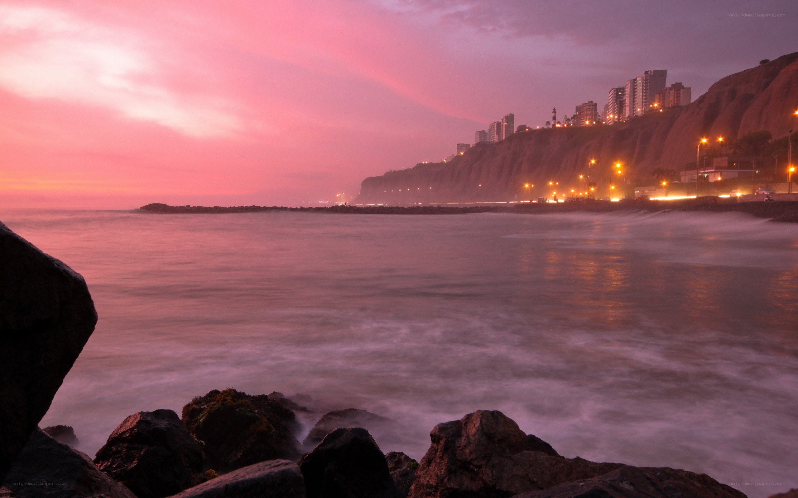 sunset over coastal city