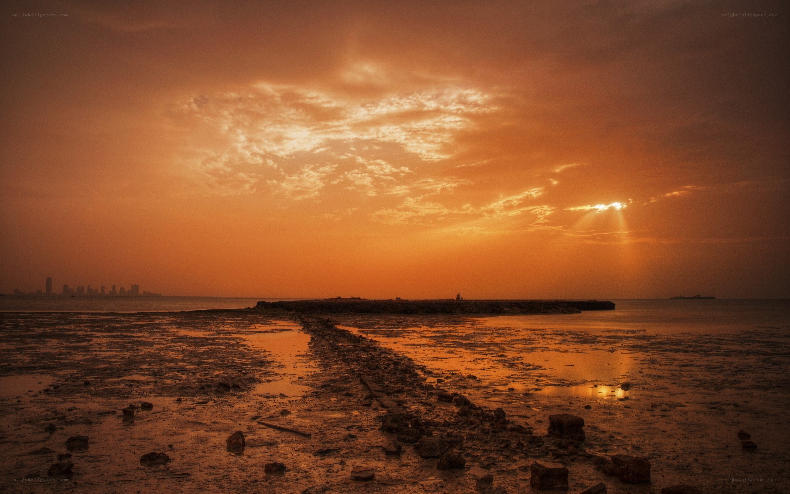sunset over coastal city