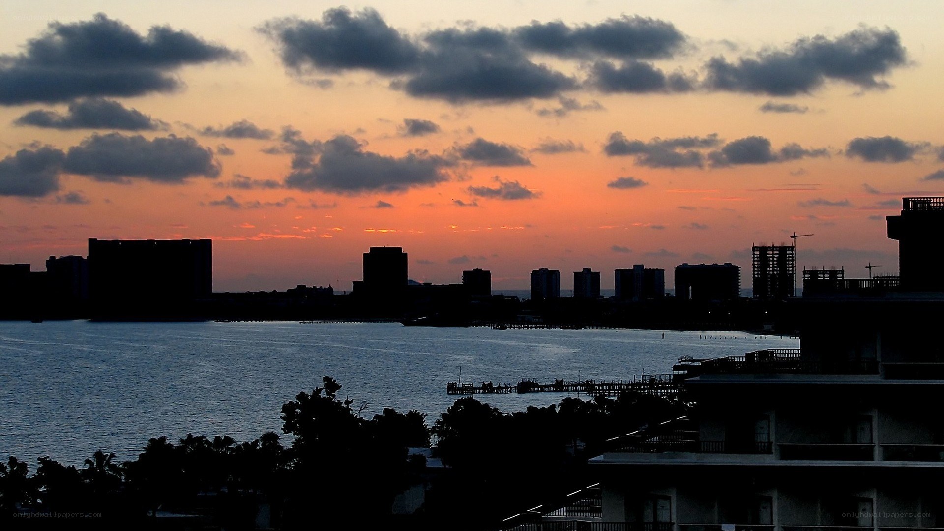 sunset over coastal city