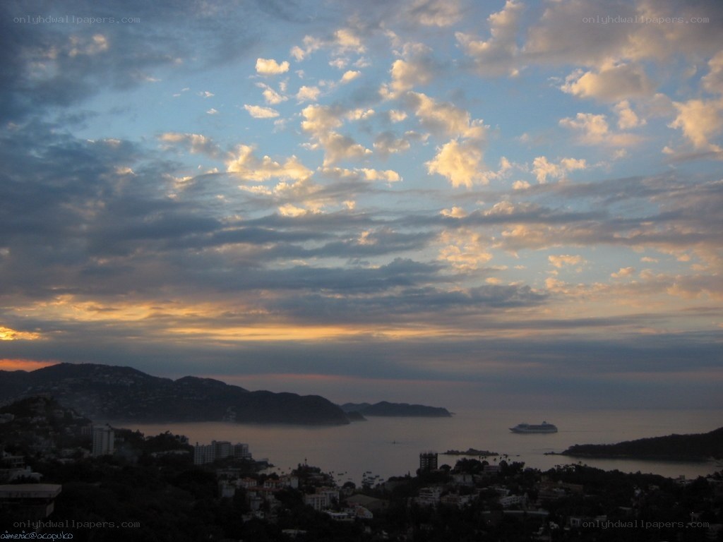 sunset over coastal city