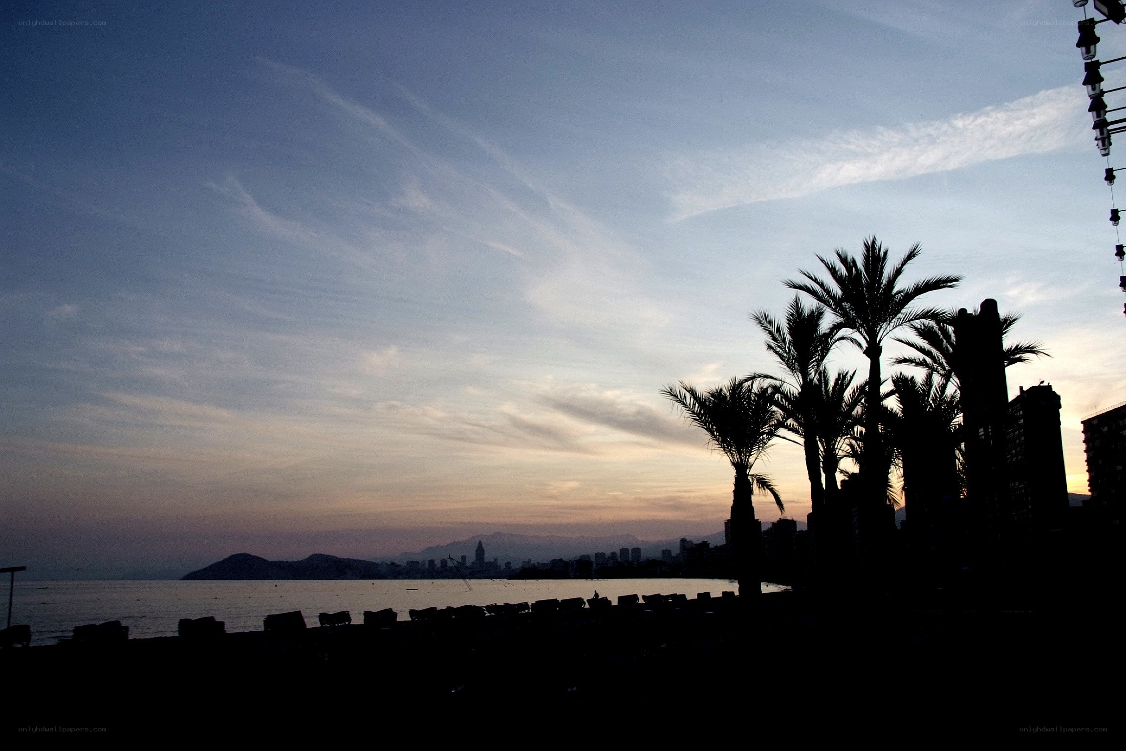 sunset over coastal city