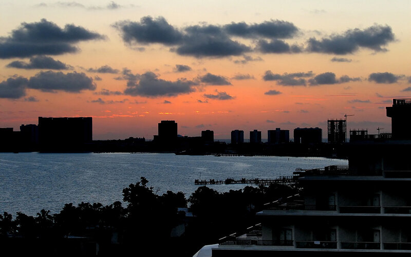 sunset over coastal city