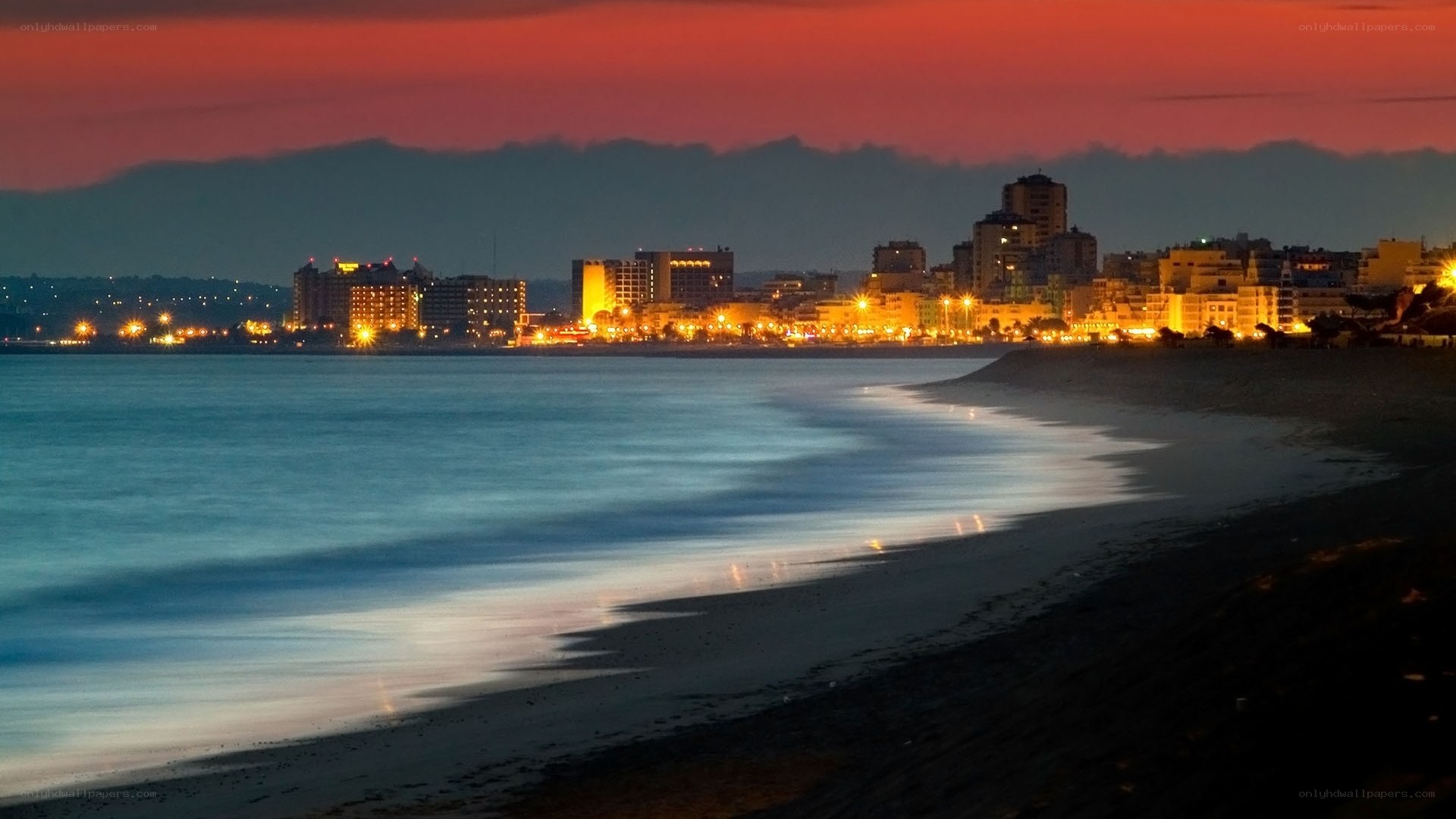 sunset over coastal city