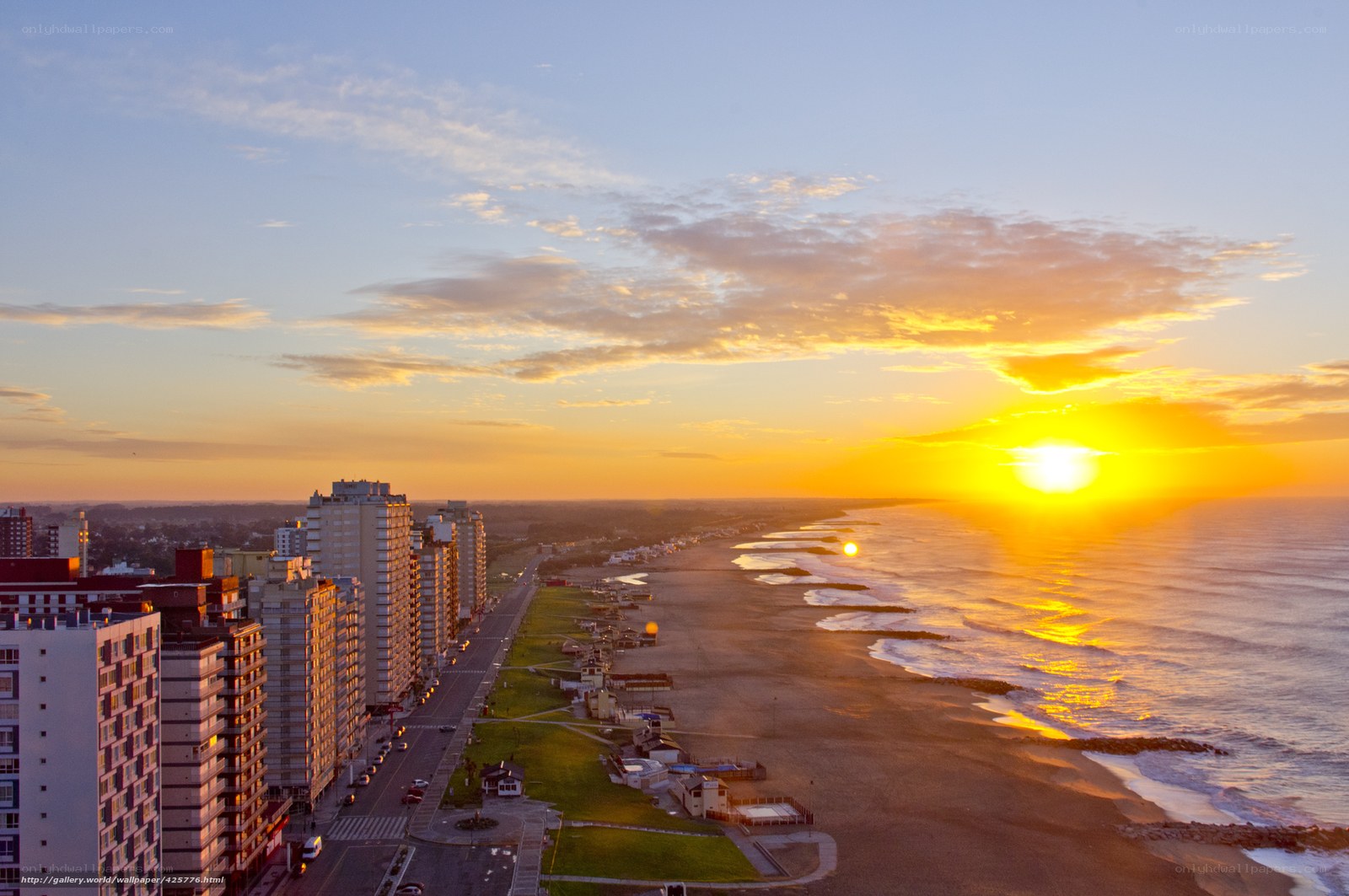 Sunset over coastal city