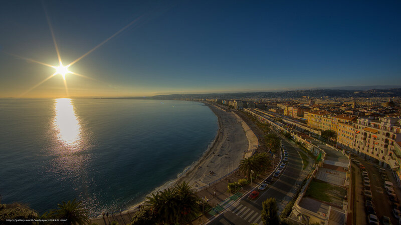 Sunset over Coastal City — Blue, Serene, Photograph, Sea, Beach