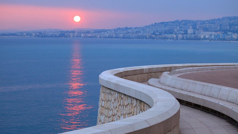 Sunset over Coastal City — Blue, Serene, Photograph, Sea