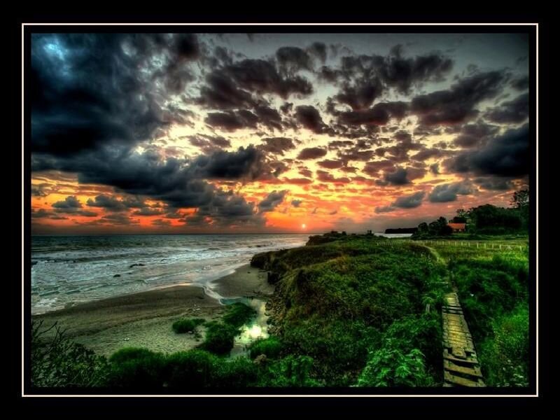 Sunset over Coastal Cliff — Orange, Dramatic