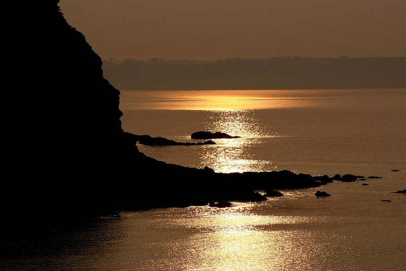 Sunset over coastal cliffs