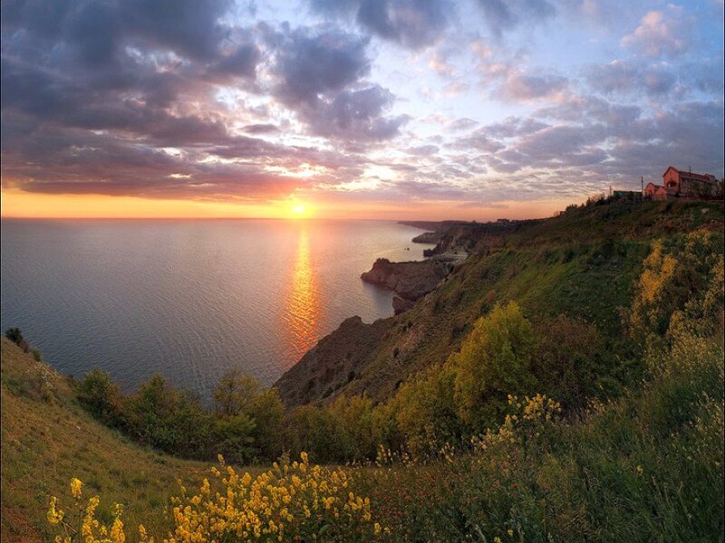 Sunset over coastal cliffs