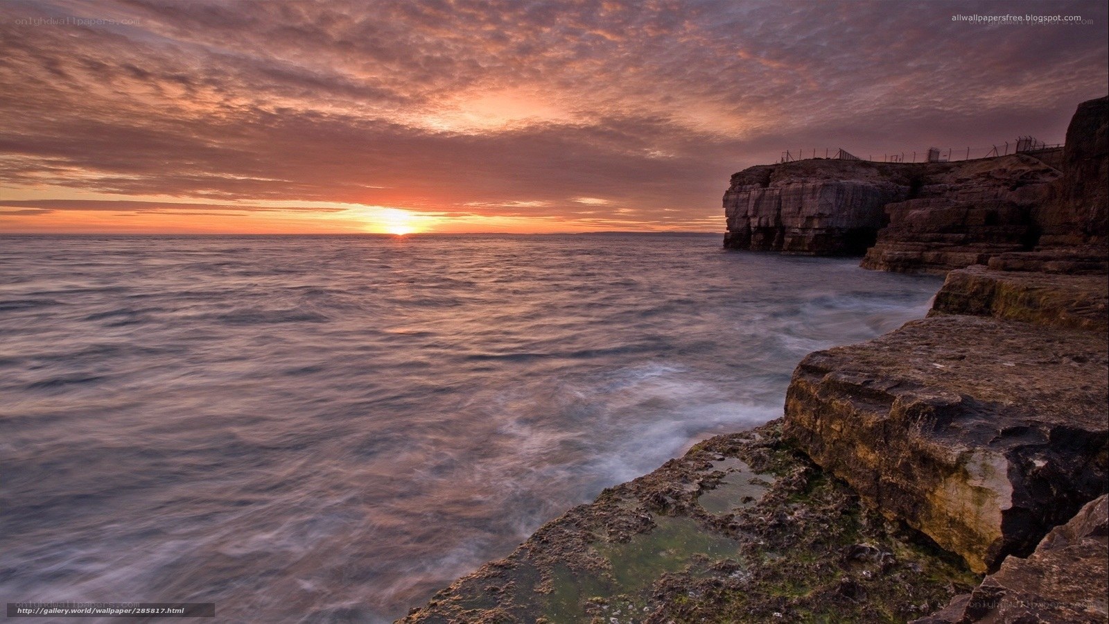 Sunset over coastal cliffs