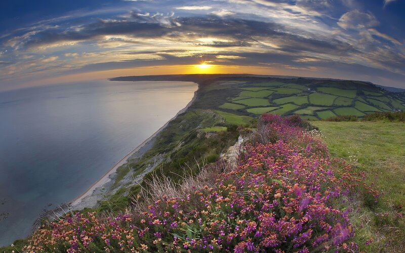 Sunset over coastal cliffs