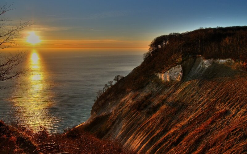 Sunset over coastal cliffs