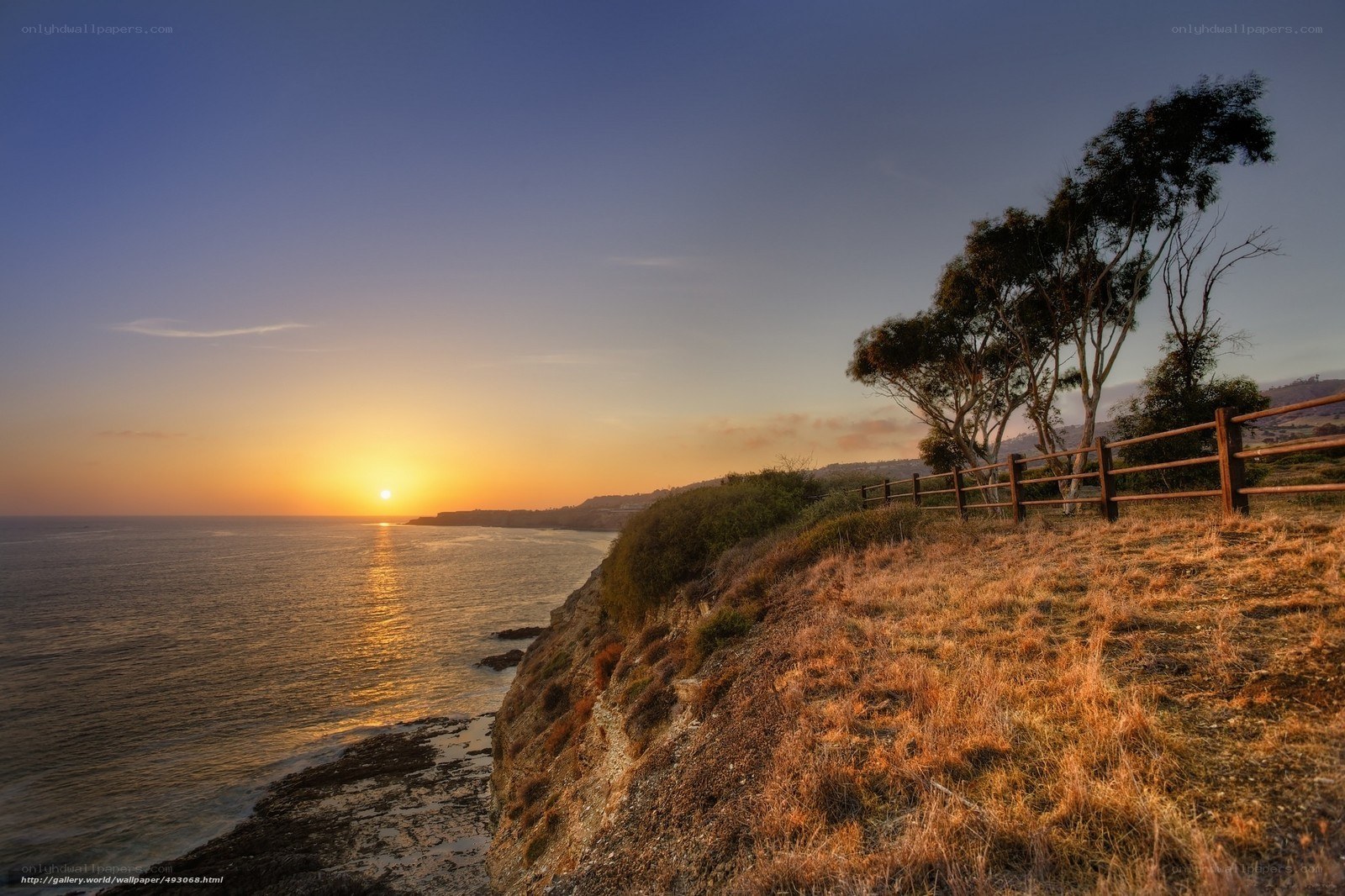 Sunset over coastal cliffs