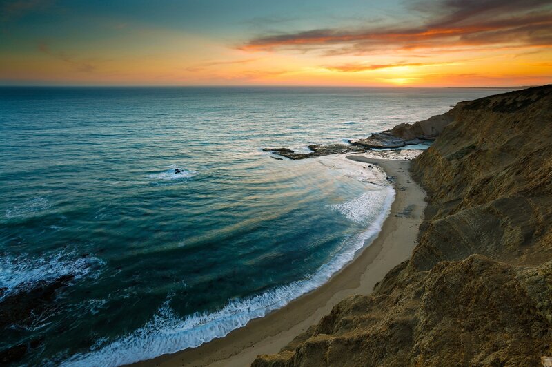 Sunset over coastal cliffs